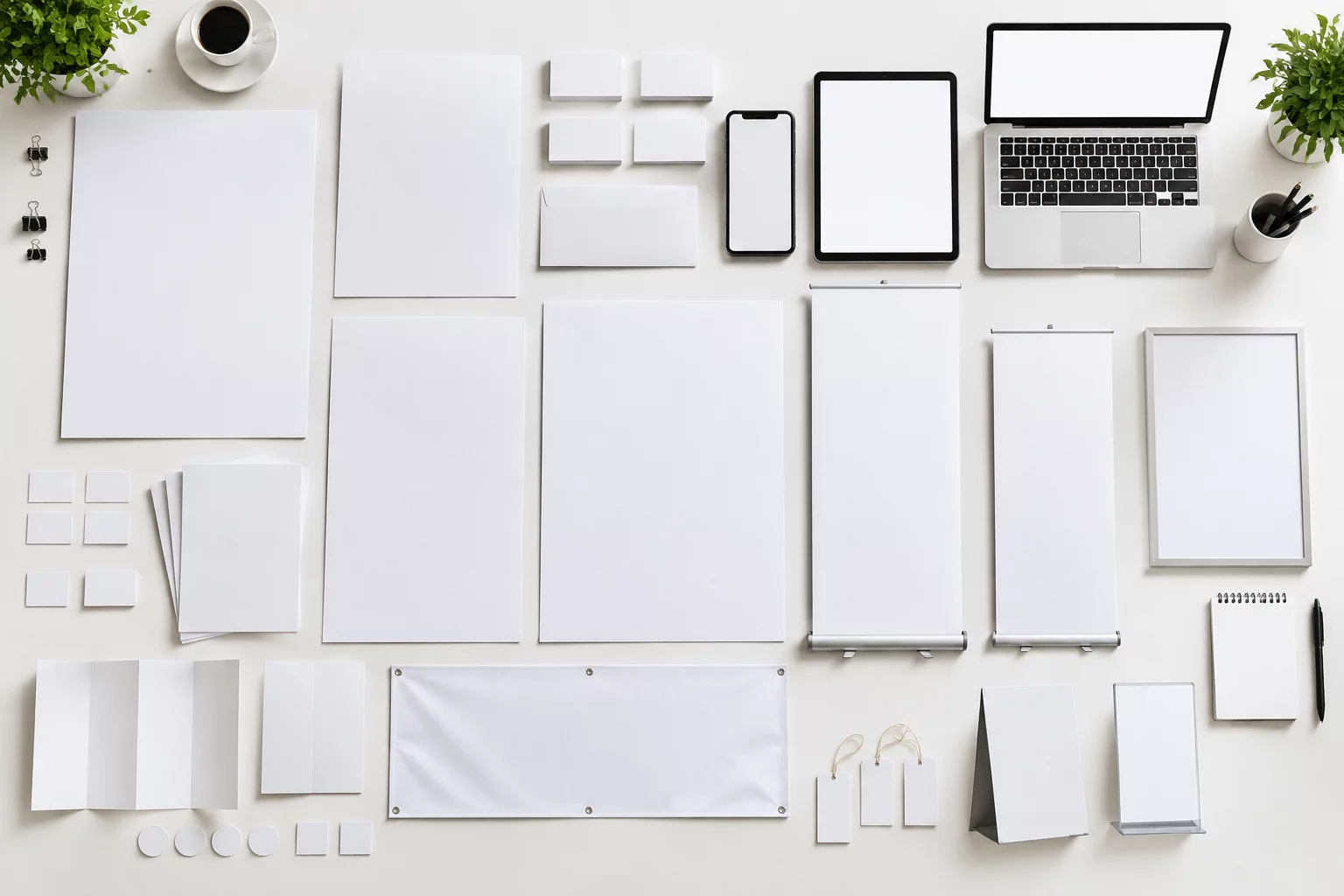 A full suite of marketing materials laid out on a table.